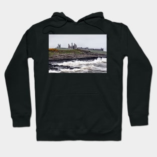 Rough waves battering the coast near Dustanburgh castle Northumberland, UK Hoodie